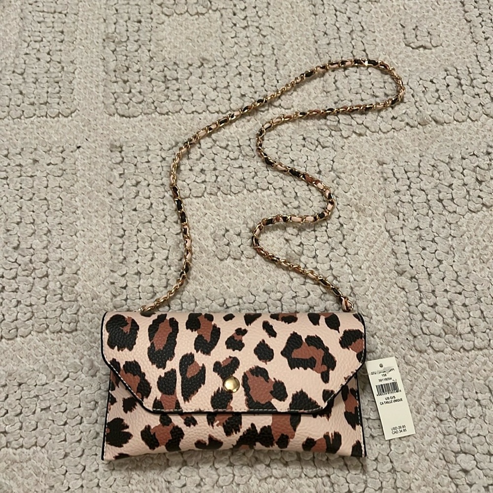 AERI sunglasses case with strap BUT easily can be worn as a crossbody purse!